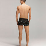 Back photo for a model wearing CottoSilk Galaxy Cotton Trunk in Black with smooth finish and space print.