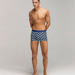 Front photo for a Model wearing Grid Modal Trunk with a geometric pattern in blue.