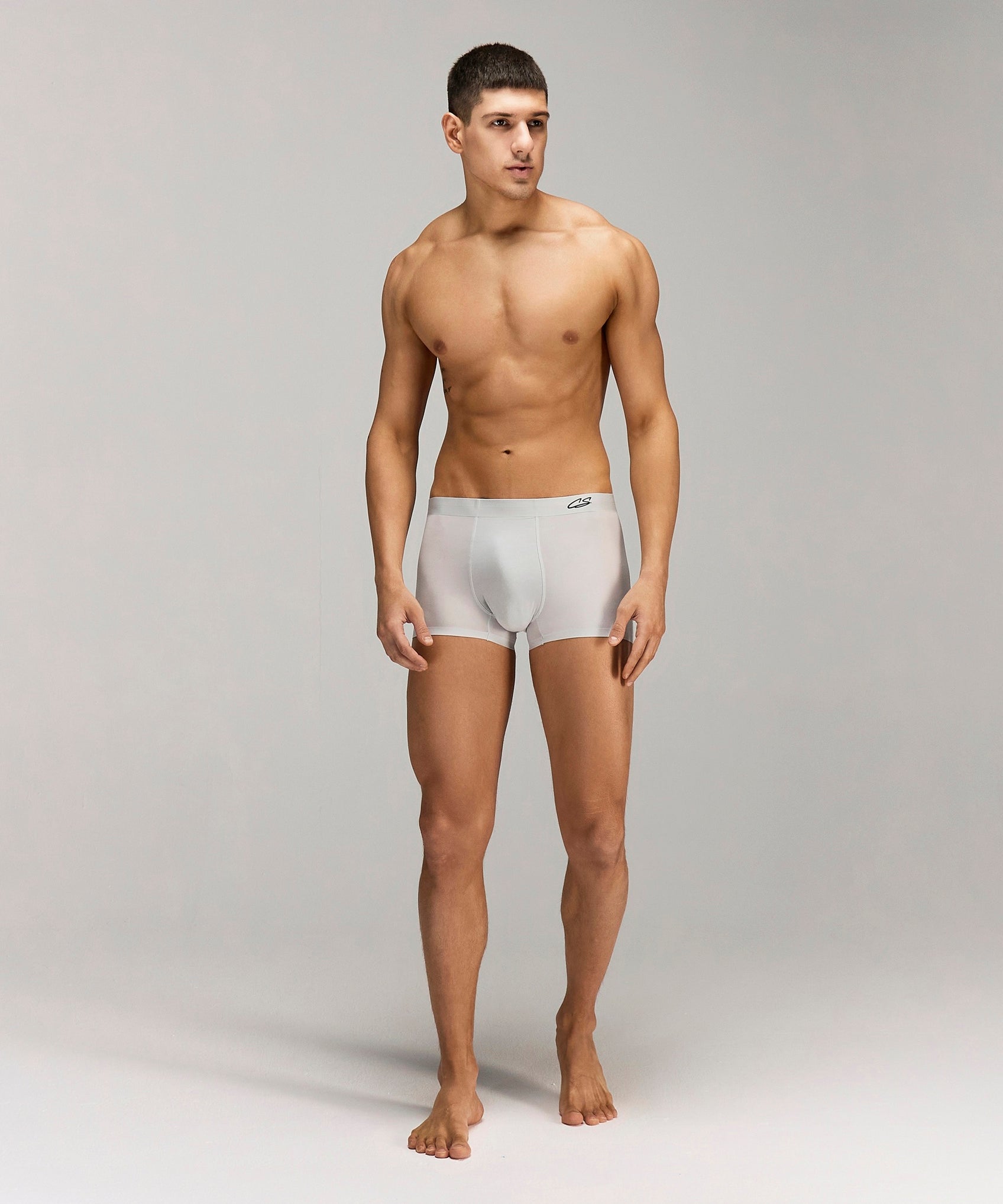 Front photo for a Model wearing Ultra Light Ice Tech Trunk in light jade.