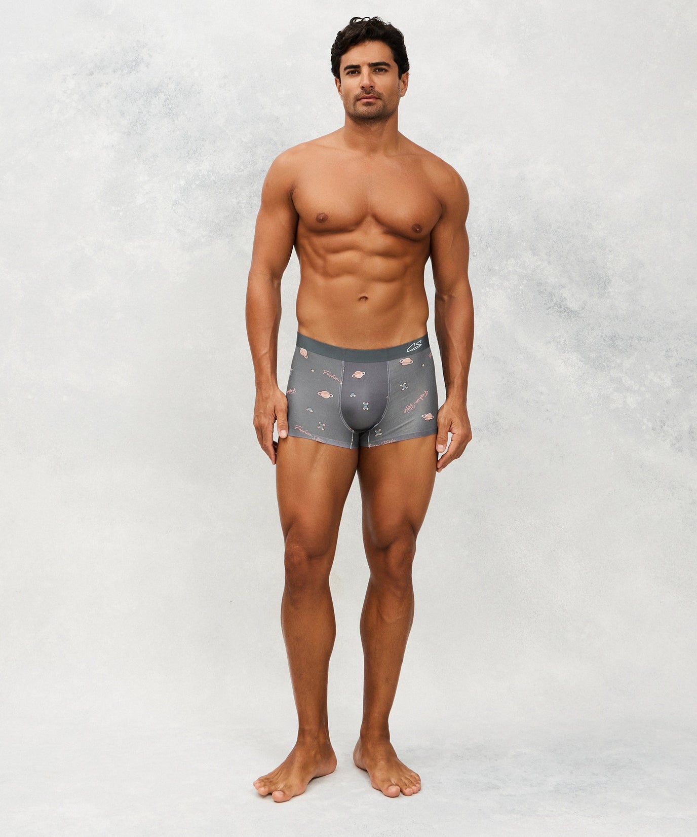 Front photo for a model wearing CottoSilk Galaxy Cotton Trunk in Grey with smooth finish and space print.