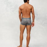 Back photo for a model wearing CottoSilk Galaxy Cotton Trunk in Grey with smooth finish and space print.