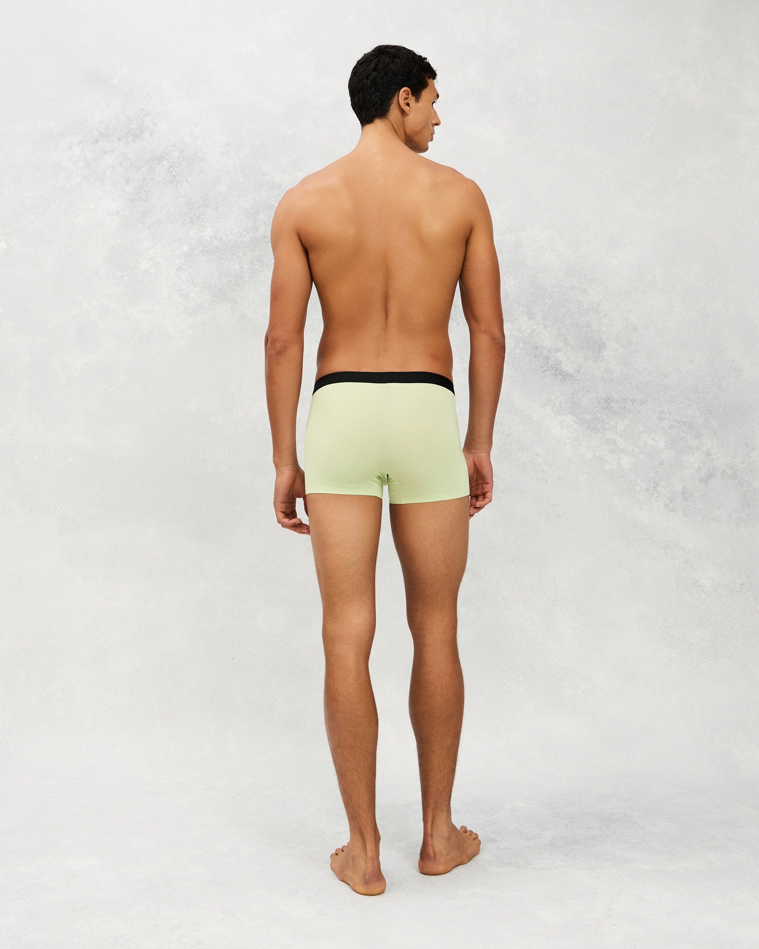 Back photo for a Model wearing Luxury Soft Modal Trunk in green.