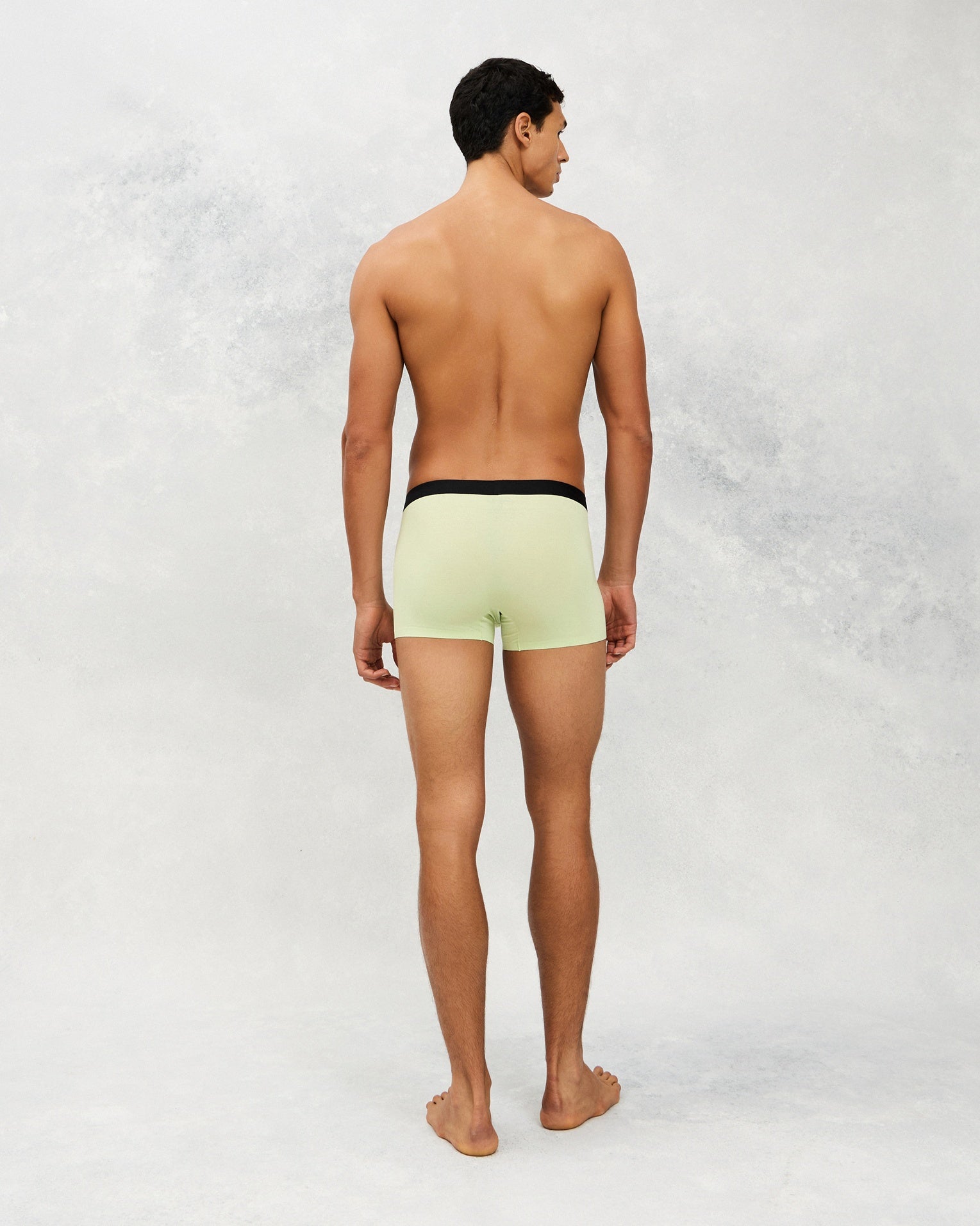 Back photo for a Model wearing Luxury Soft Modal Trunk in green.