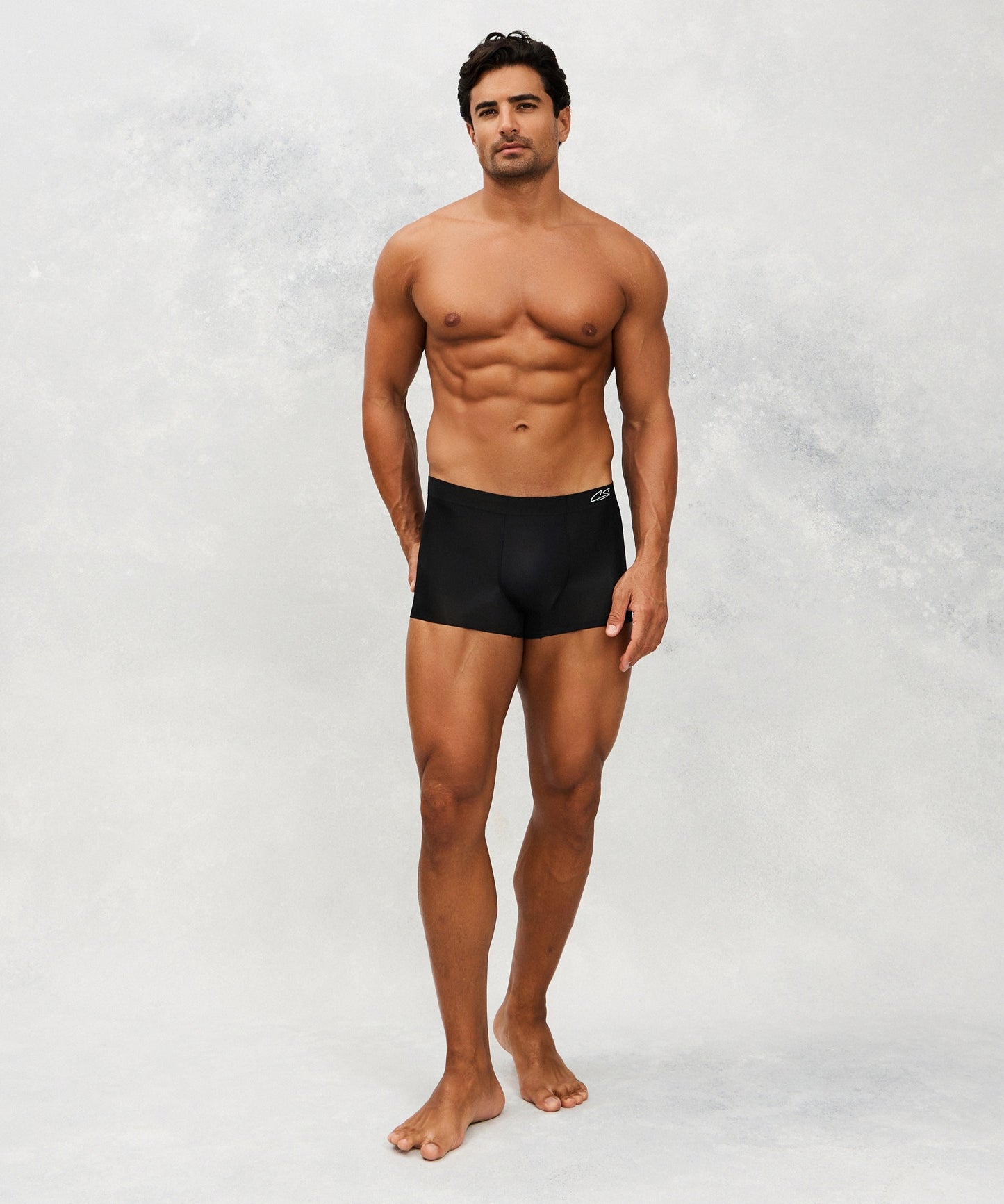 Front photo for a Model wearing Ultra Light Ice Tech Trunk in black.