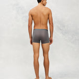Back photo for a Model wearing Ultra Light Ice Tech Trunk in dark grey.