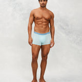 Front photo for a Model wearing Ultra Light Ice Tech Trunk in light blue.