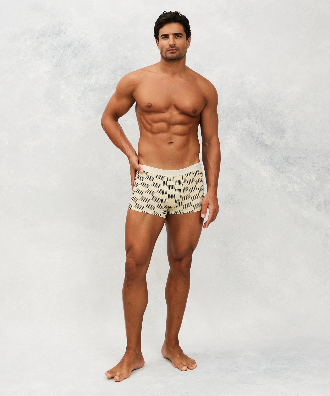 Front photo for a Model wearing Grid Modal Trunk with geometric pattern in beige.
