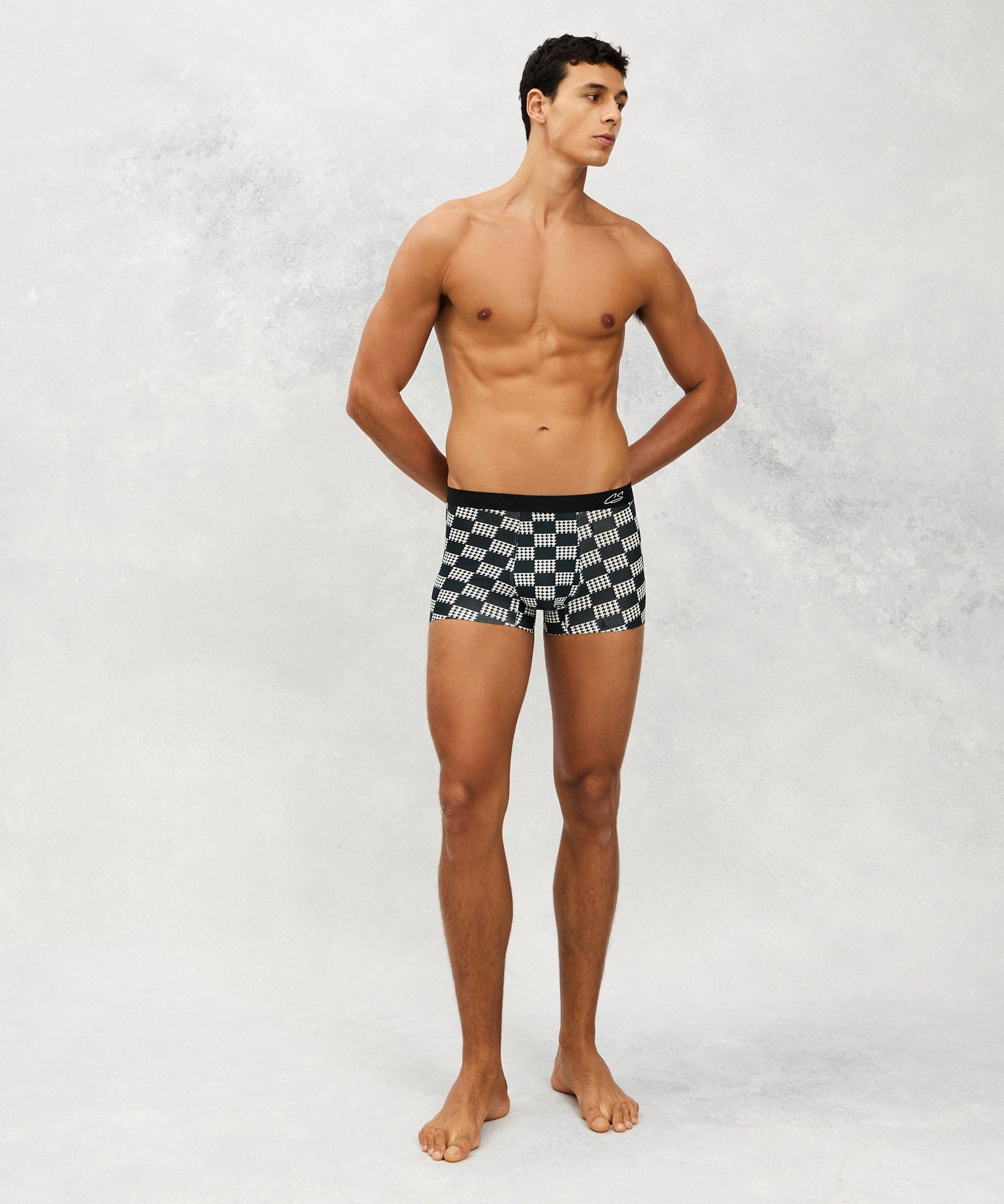Front photo for a Model wearing Grid Modal Trunk with geometric pattern in black.