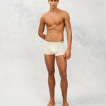 Front photo for a Model wearing Ice Tech Trunk in light green.