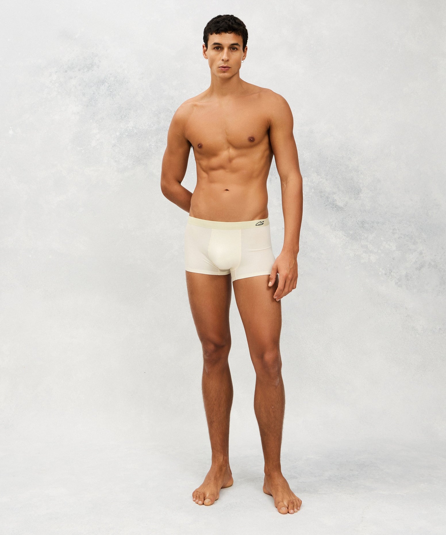 Front photo for a Model wearing Ice Tech Trunk in light green.