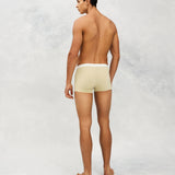 Back photo for a Model wearing Ice Tech Trunk in light yellow.