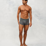 Front photo for a Model wearing Ice Tech Trunk in dark grey.