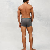 Back photo for a Model wearing Ice Tech Trunk in dark grey.