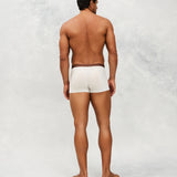 Back photo for a Model wearing Ice Tech Trunk in white.