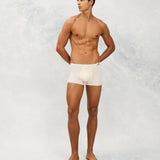 Front photo for a Model wearing Ice Tech Trunk in light orange.
