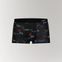 Model-less photo of CottoSilk Galaxy Cotton Trunk in Black with space-themed prints.