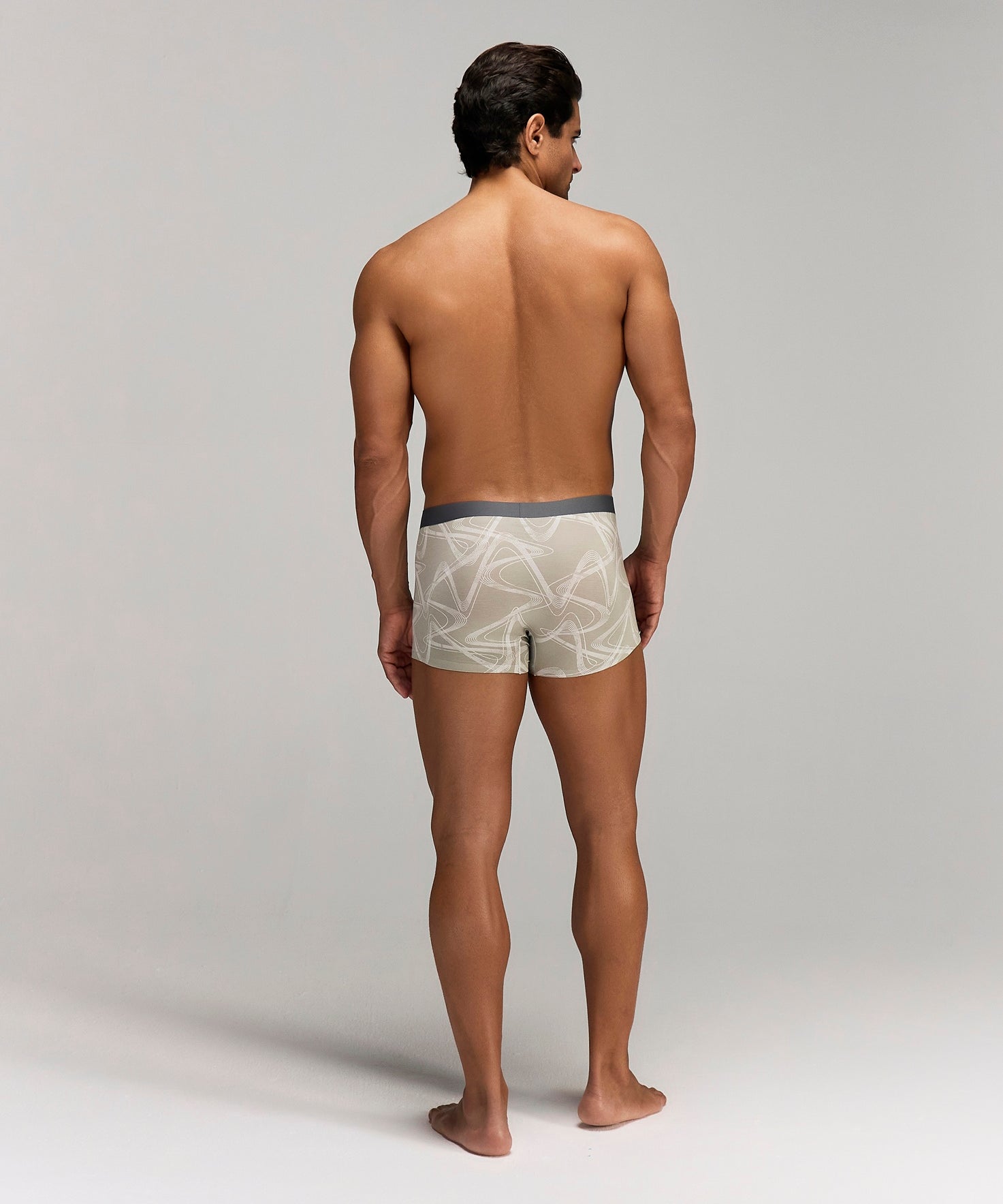 Back photo for a Model wearing CS Streak Modal Trunk in beige.