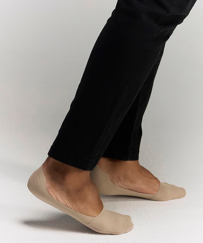 Side Photo of model wearing  No Trace Ice Sock Beige