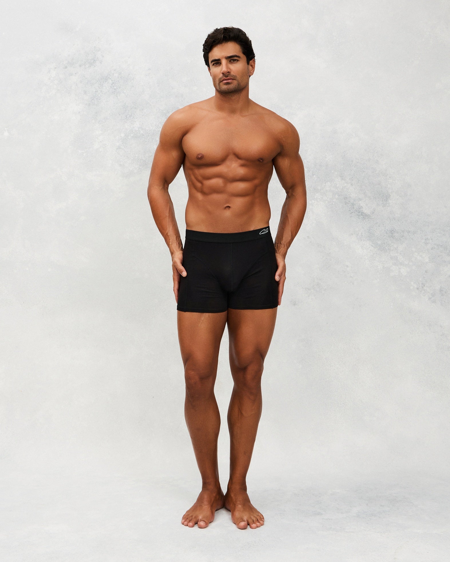 Front photo for a Model wearing CottoSilk Ultra Light Cotton Boxer Brief in black.
