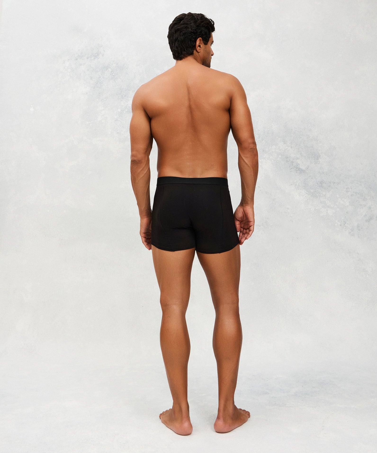 Back photo for a Model wearing CottoSilk Ultra Light Cotton Boxer Brief in black.