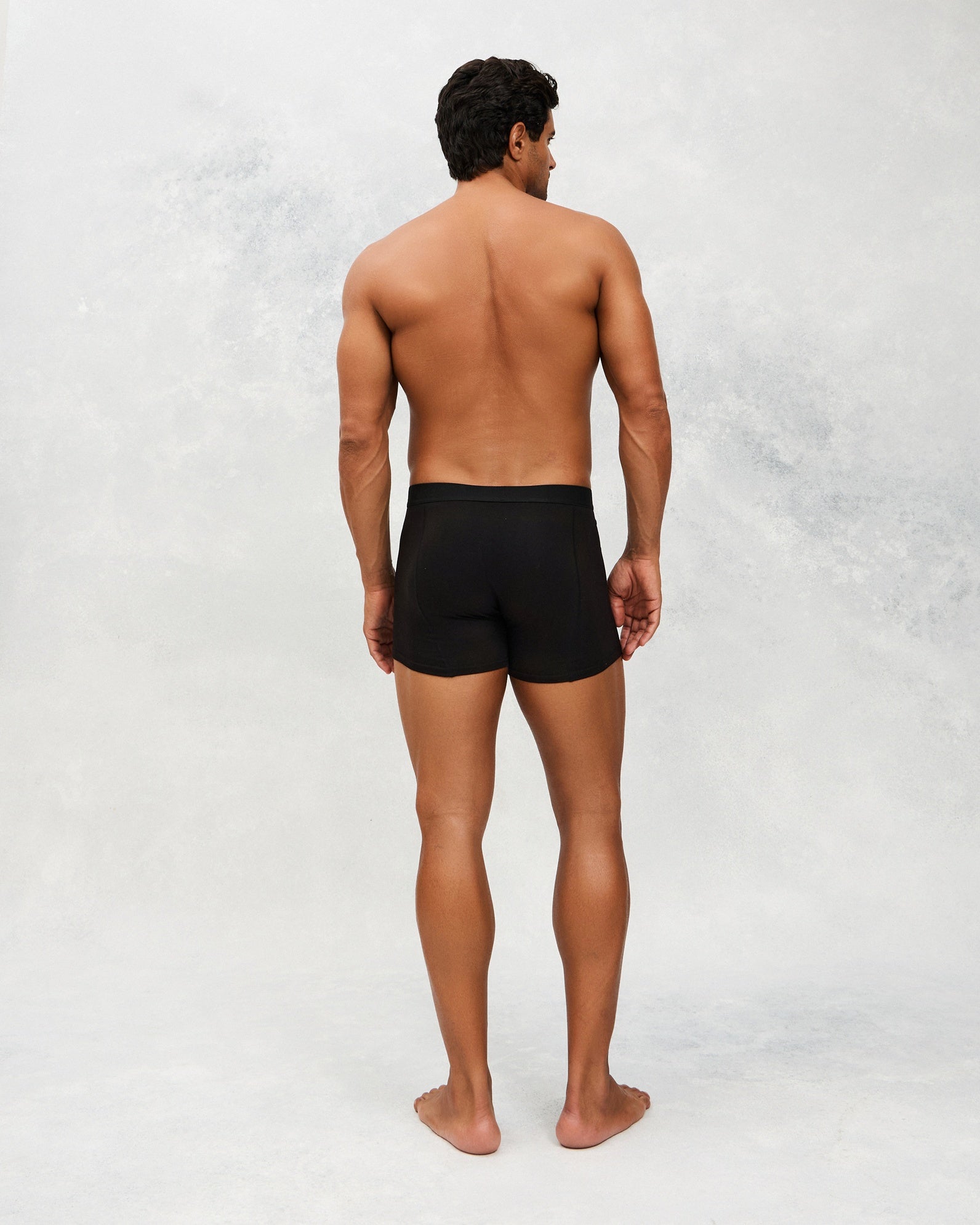 Back photo for a Model wearing CottoSilk Ultra Light Cotton Boxer Brief in black.