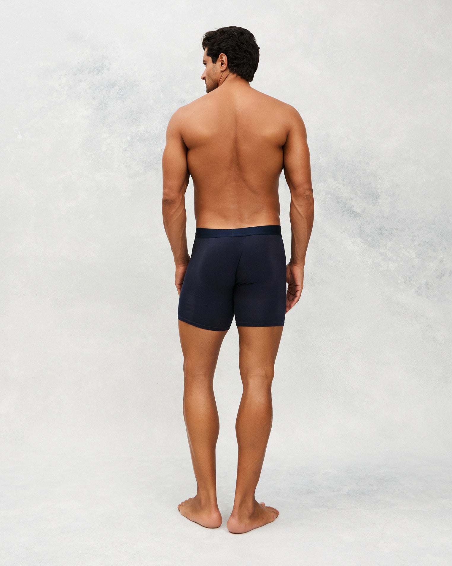 Back photo for a Model wearing CottoSilk Ultra Light Cotton Boxer Brief in navy.