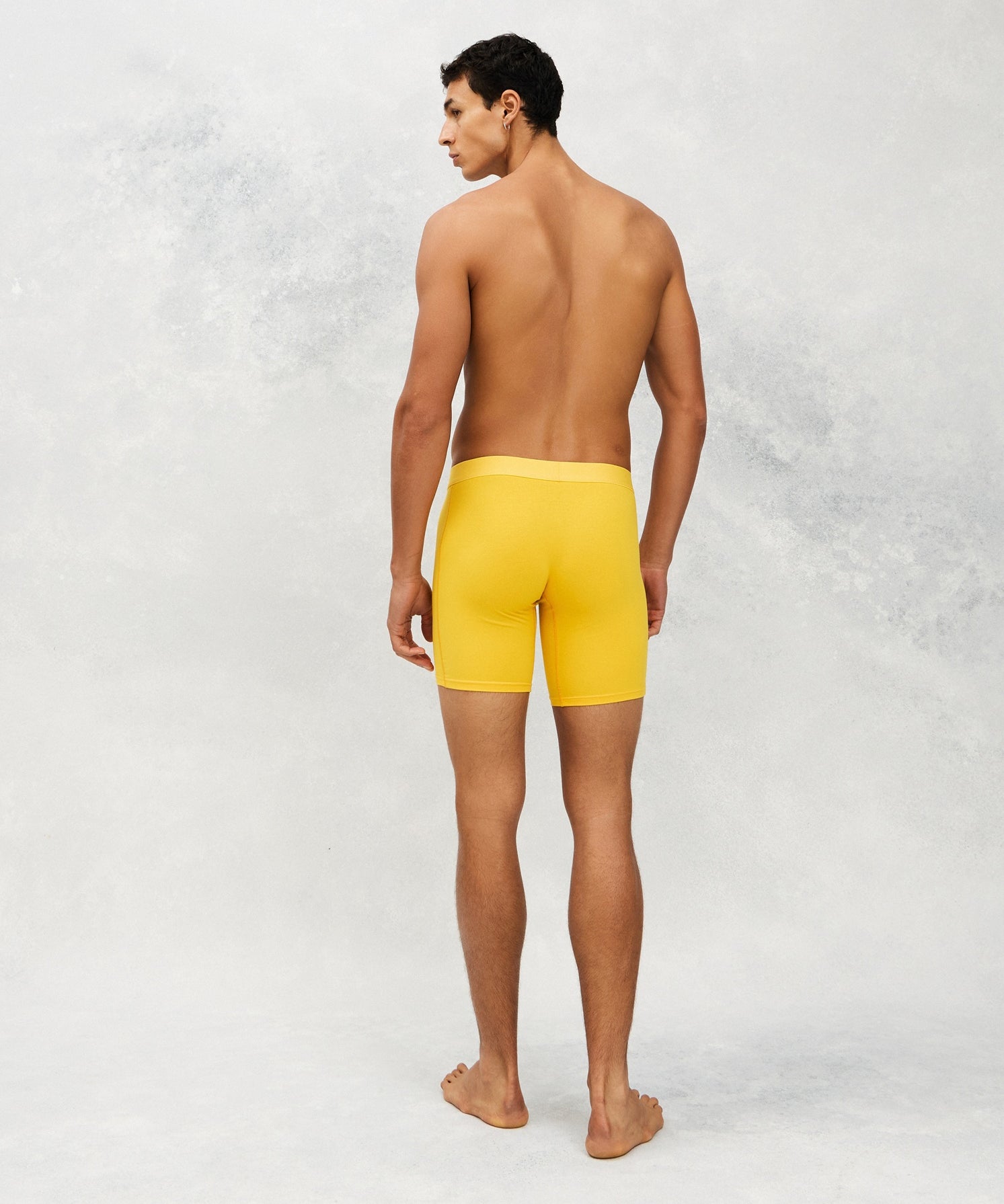 Back image for a Model wearing  CottoSilk Long Cotton Boxer Brief in Yellow with smooth finish.