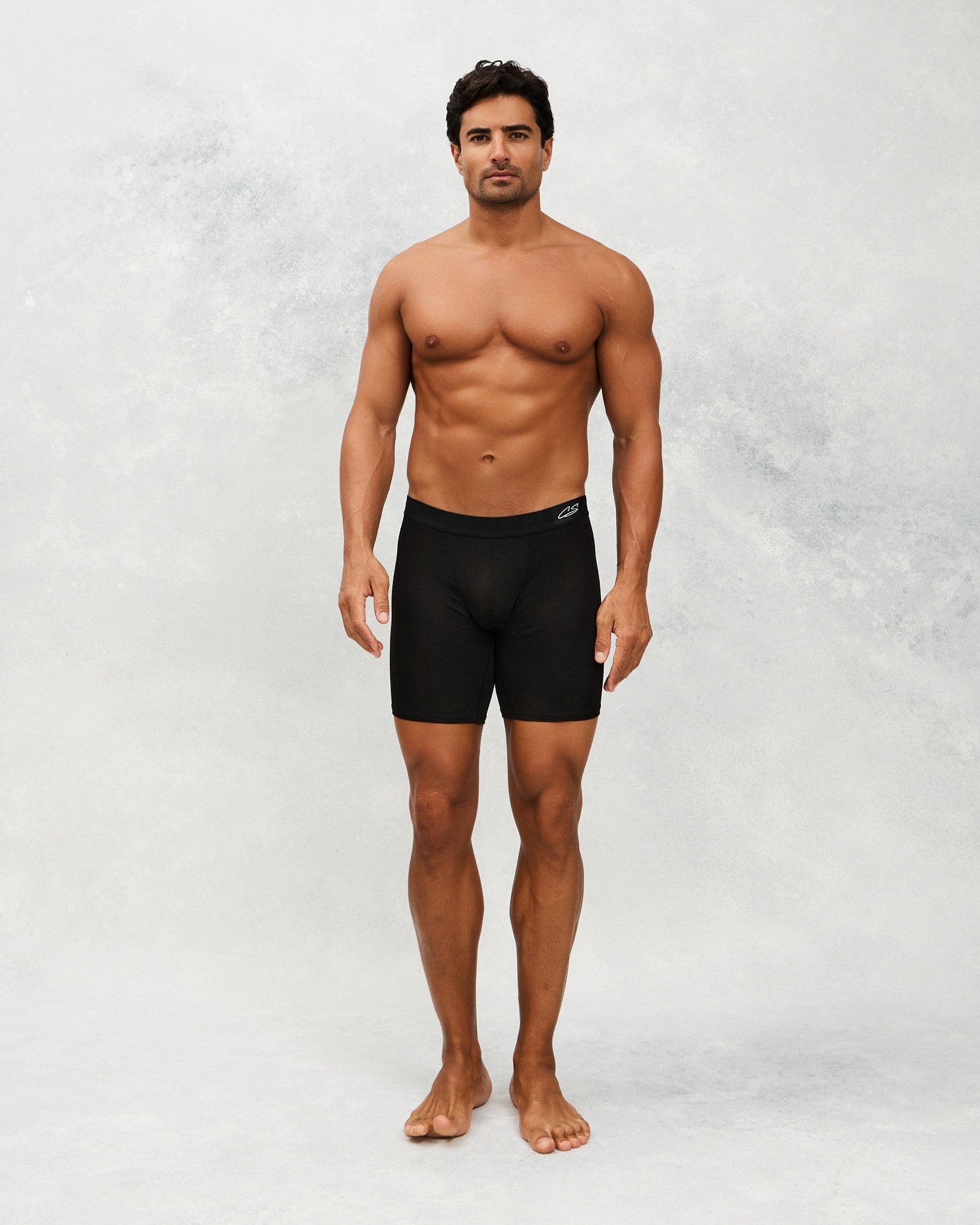 Front image for a Model wearing  CottoSilk Long Cotton Boxer Brief in Black with smooth finish.