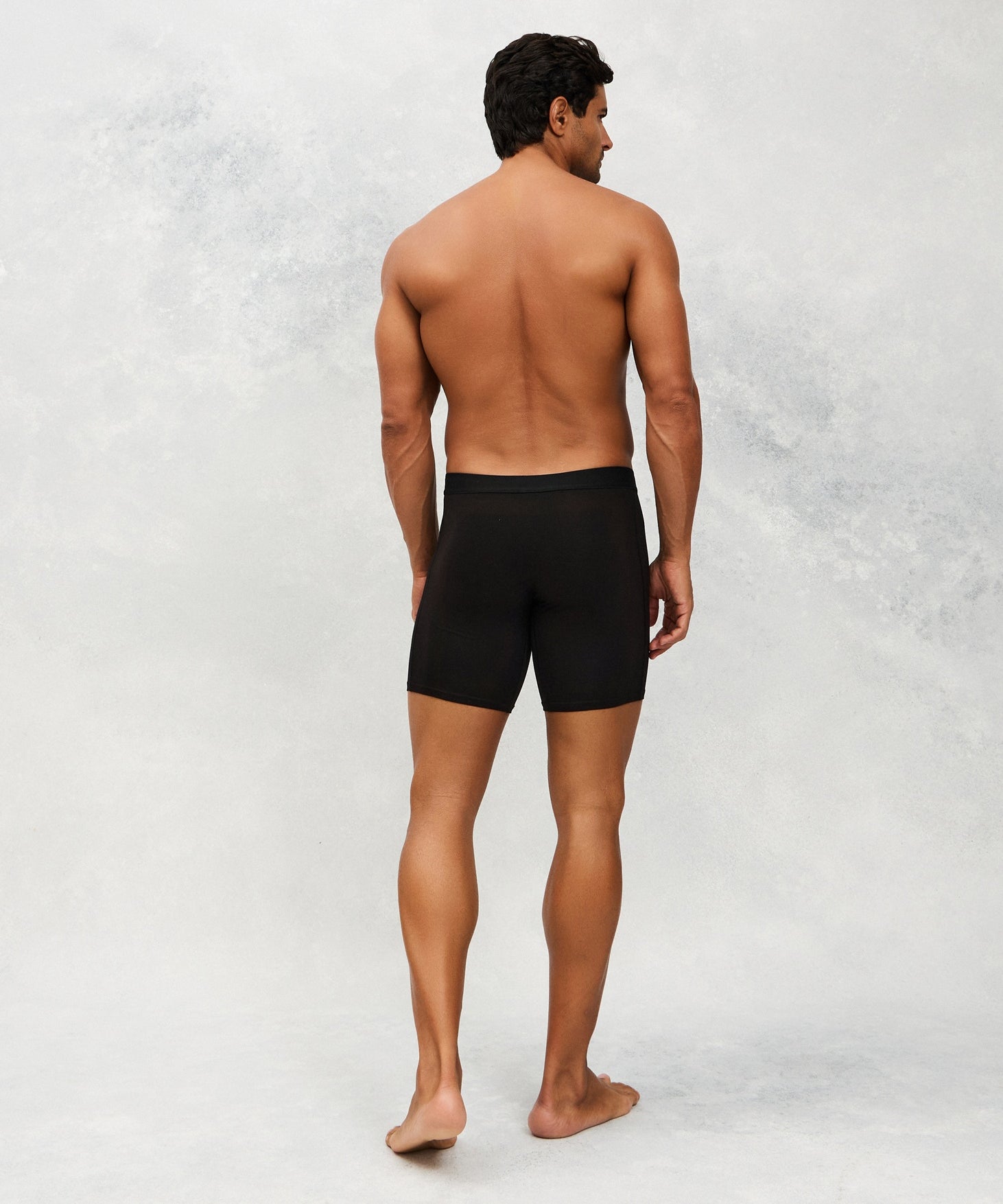 Back image for a Model wearing  CottoSilk Long Cotton Boxer Brief in Black with smooth finish.
