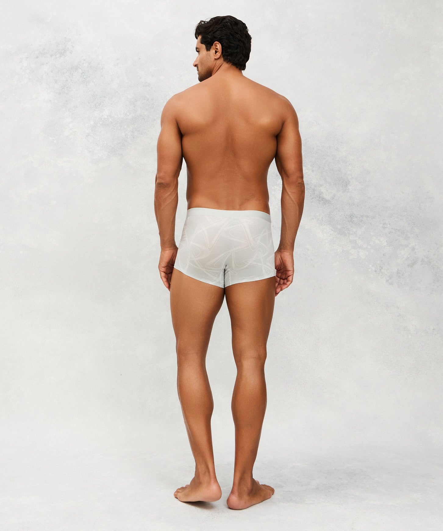 Back photo for a Model wearing CS Streak Modal Trunk in light grey.