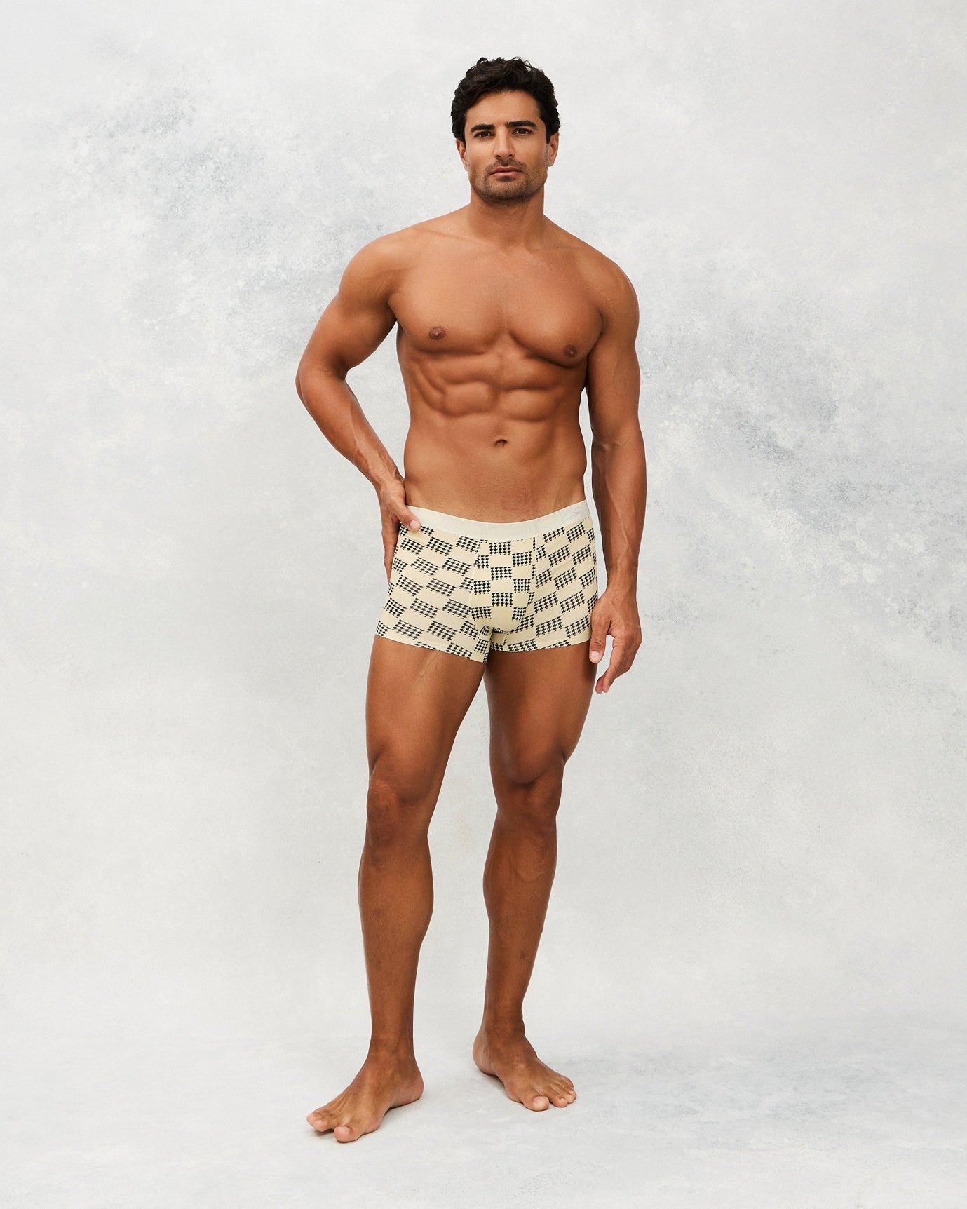 Front photo for a Model wearing Grid Modal Trunk with geometric pattern in beige.