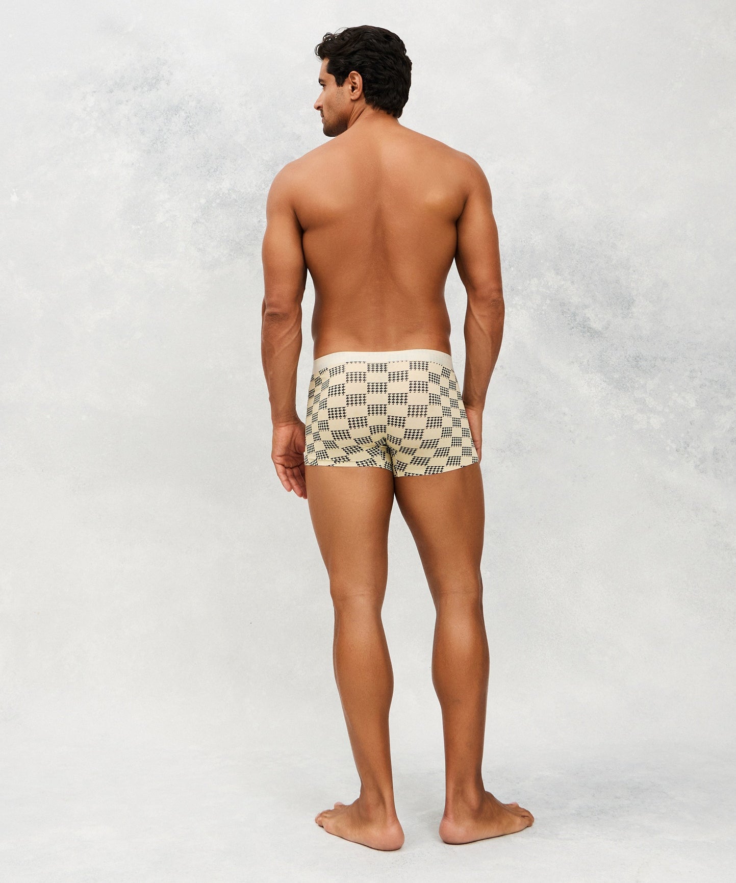 Back photo for a Model wearing Grid Modal Trunk with a geometric pattern in beige.