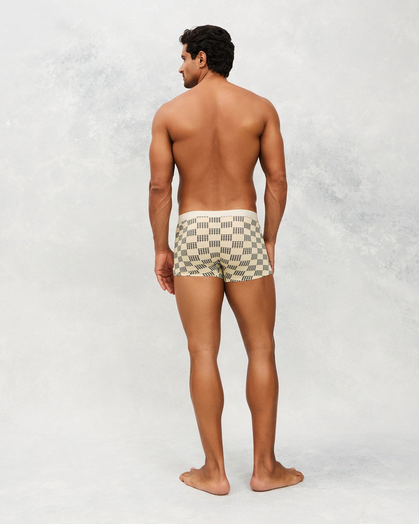 Back photo for a Model wearing Grid Modal Trunk with a geometric pattern in beige.
