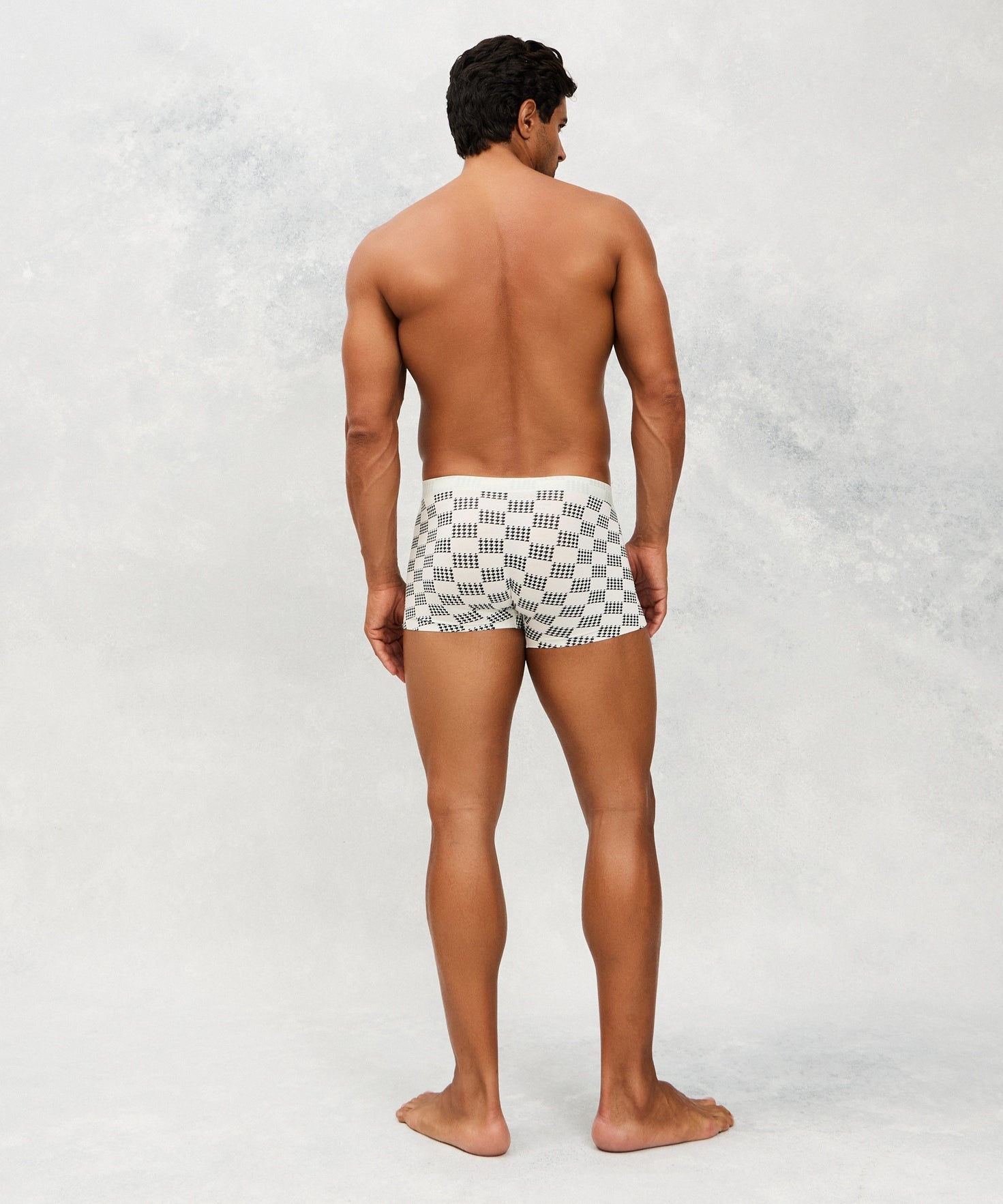Back photo for a Model wearing Grid Modal Trunk with geometric pattern in light grey.