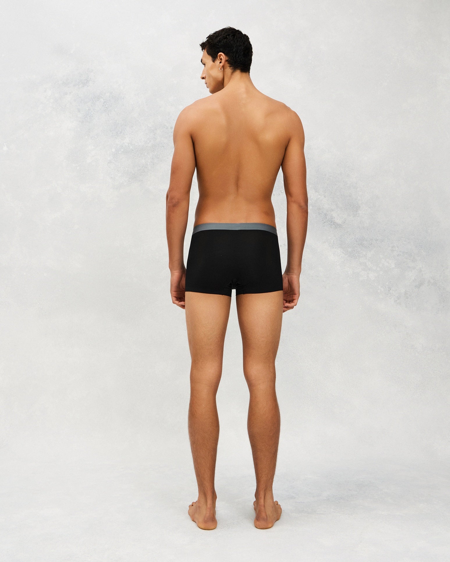 Back photo for a Model wearing Ice Tech Trunk in black.