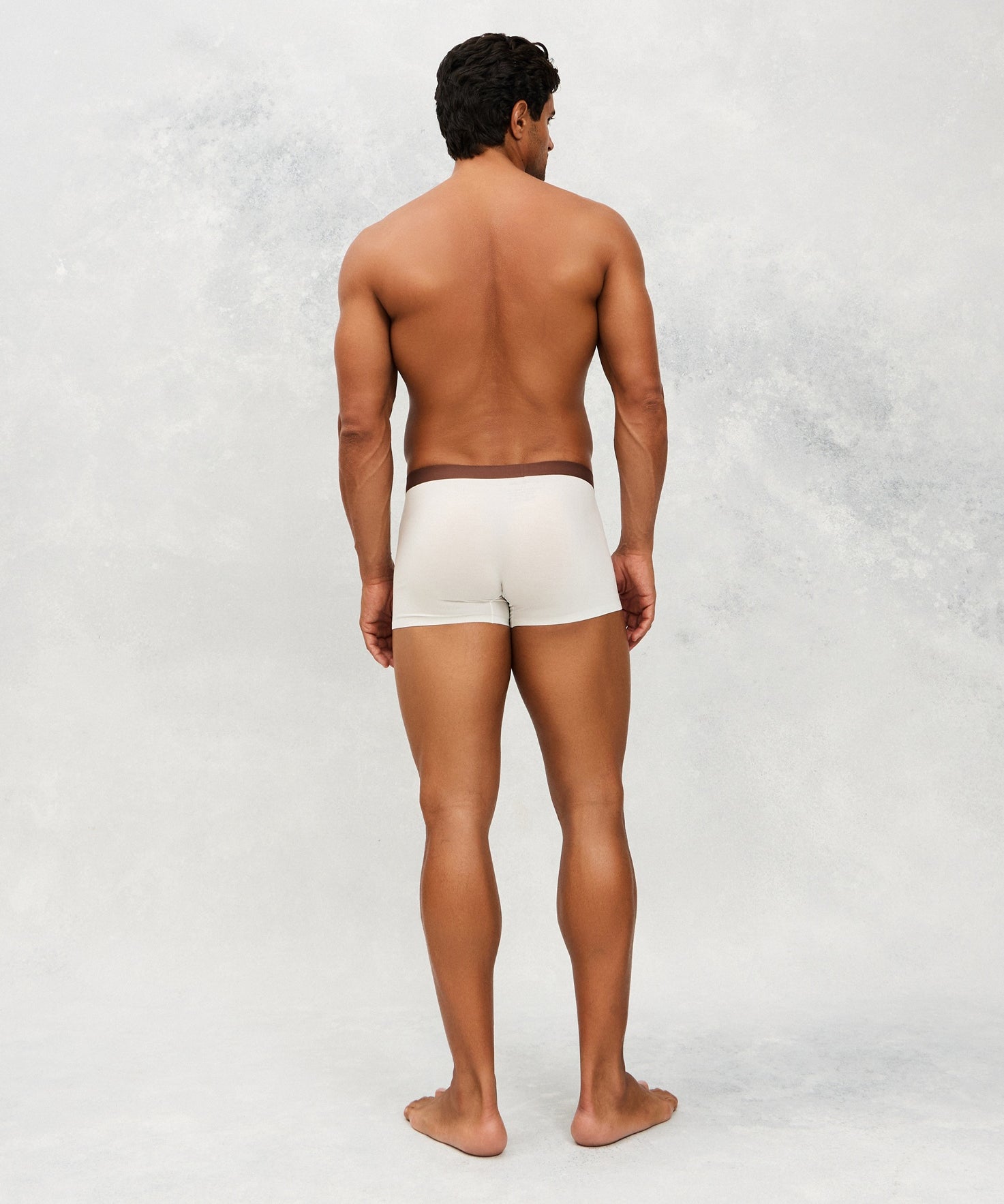 Back photo for a Model wearing Ice Tech Trunk in white.