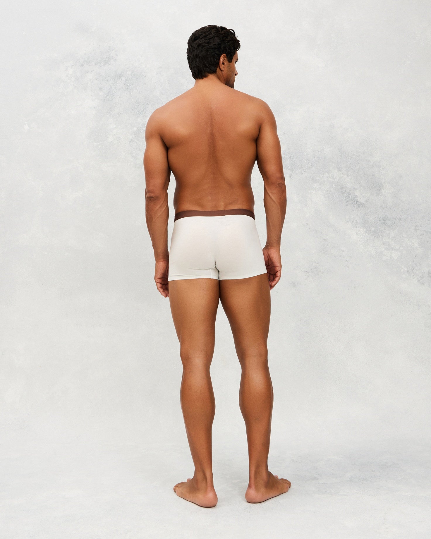 Back photo for a Model wearing Ice Tech Trunk in white.