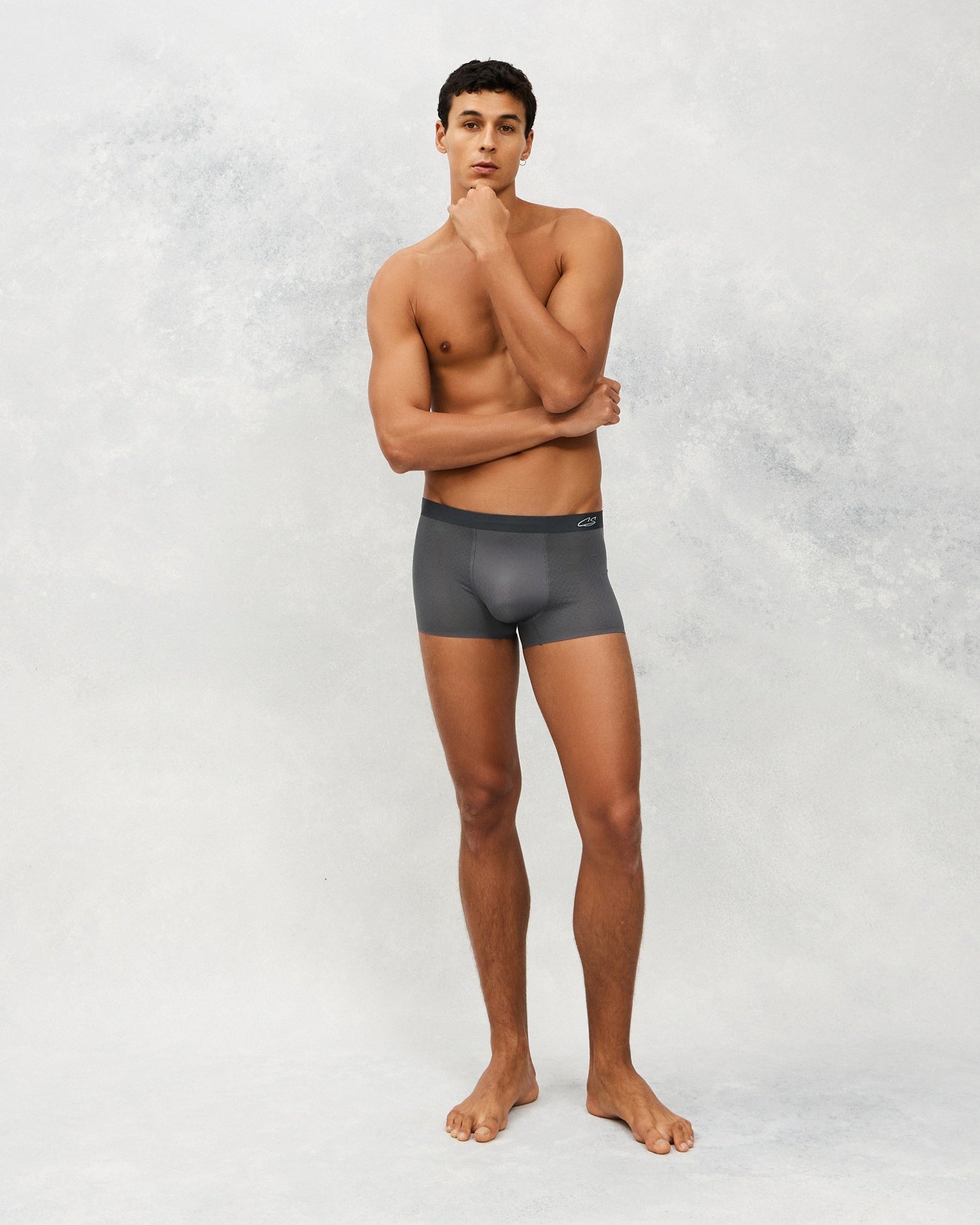 Front photo for a Model wearing Airflow Ice Trunk in dim grey.