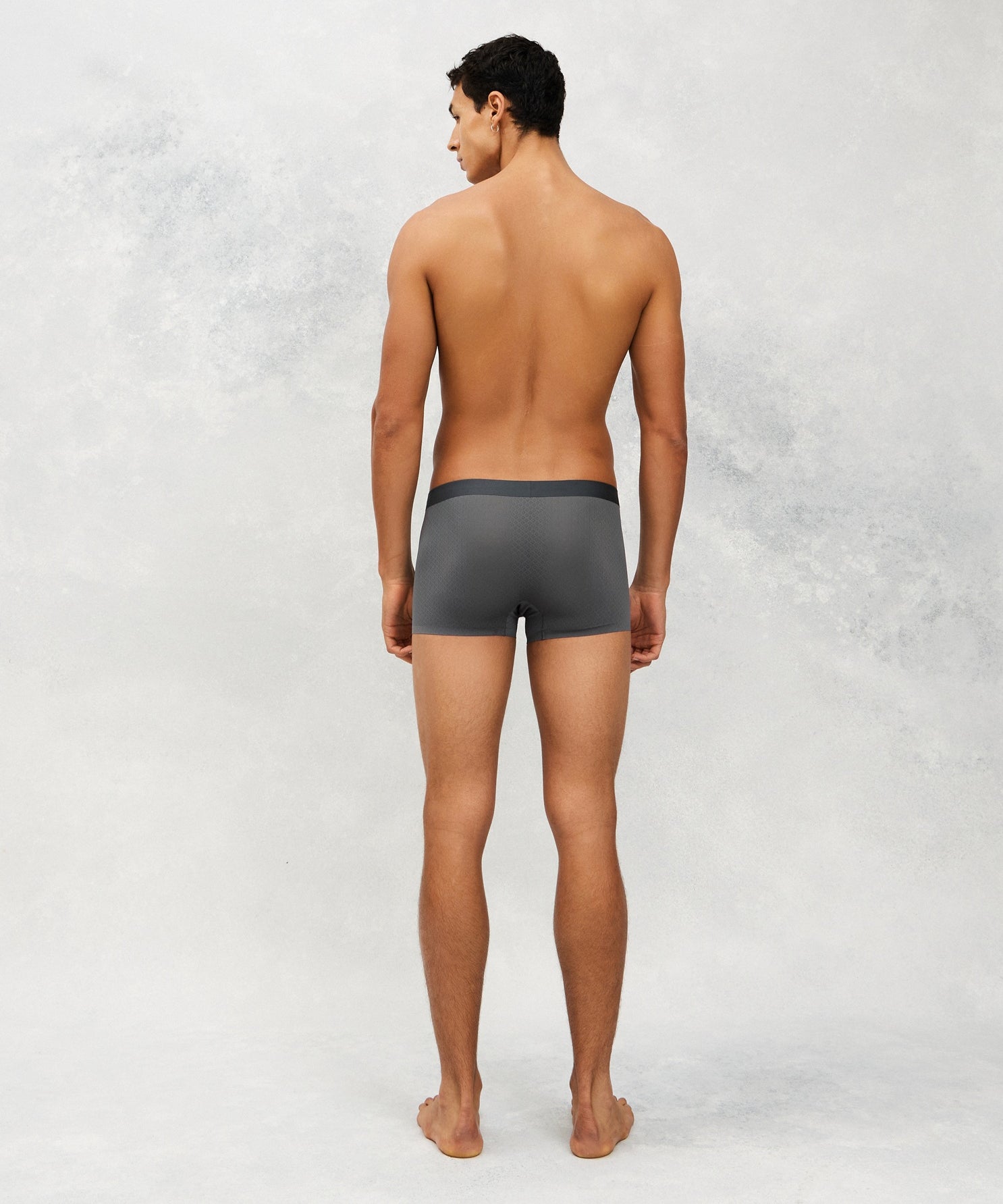 Back photo for a Model wearing Airflow Ice Trunk in dim grey.