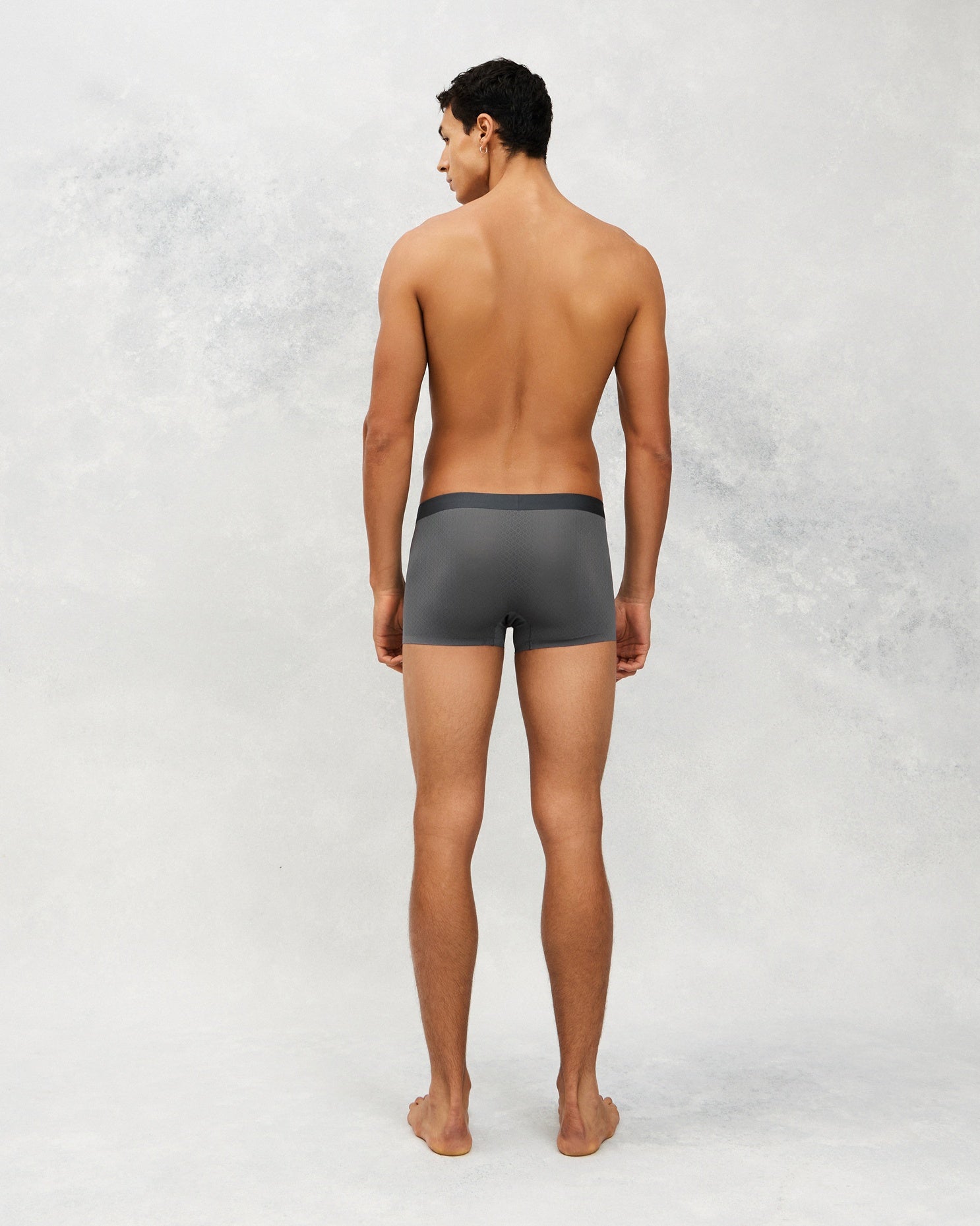 Back photo for a Model wearing Airflow Ice Trunk in dim grey.
