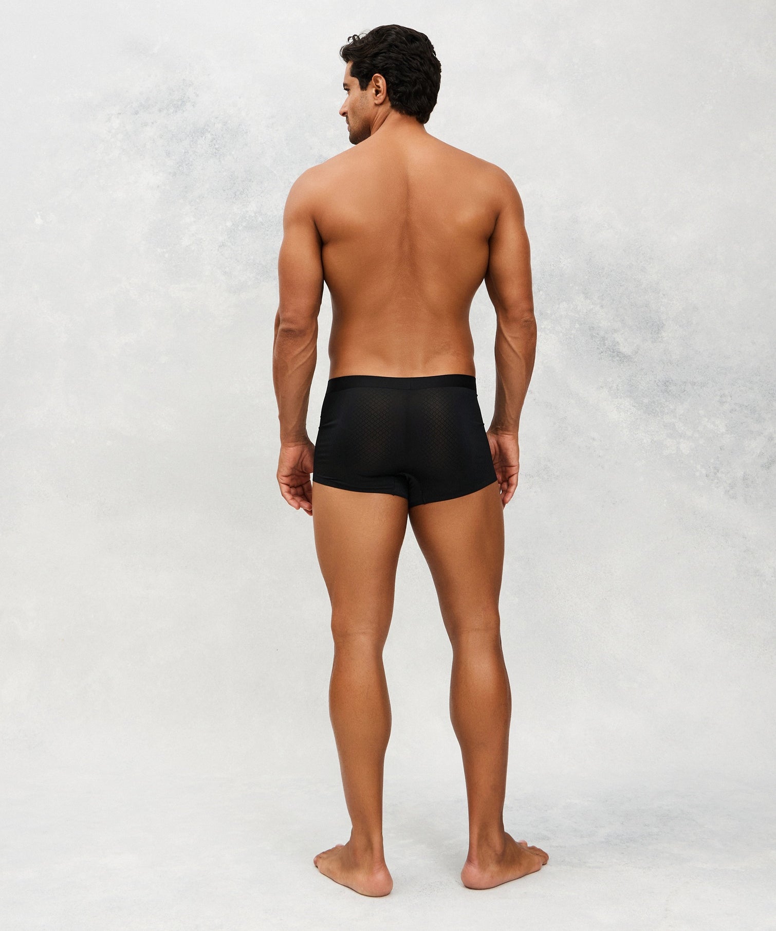 Back photo for a Model wearing Airflow Ice Trunk in Black.