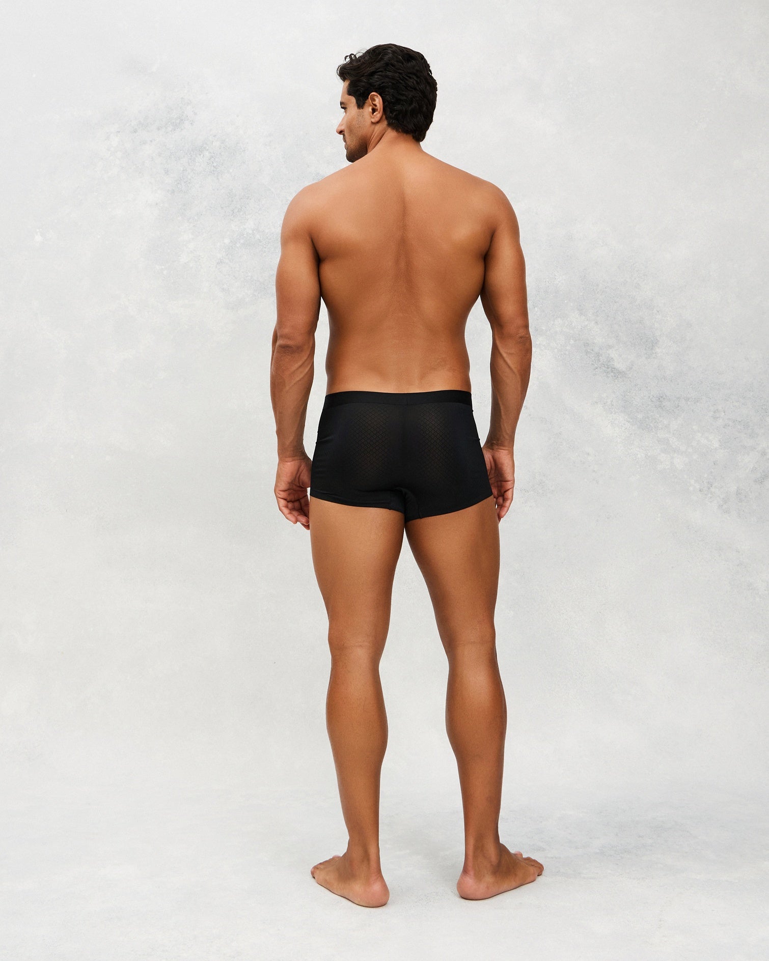 Back photo for a Model wearing Airflow Ice Trunk in Black.