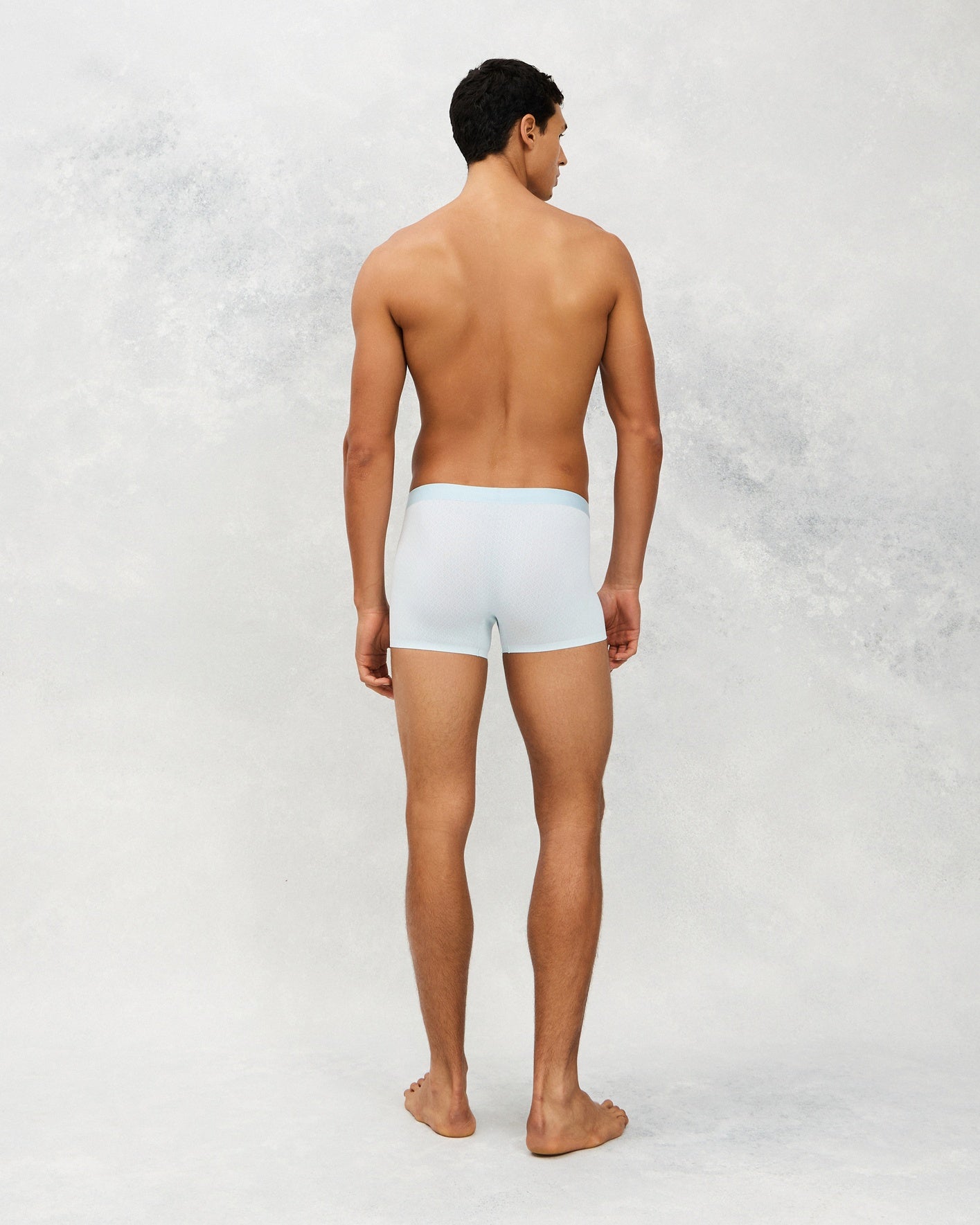 Back photo for a Model wearing Airflow Ice Trunk in Light Blue.