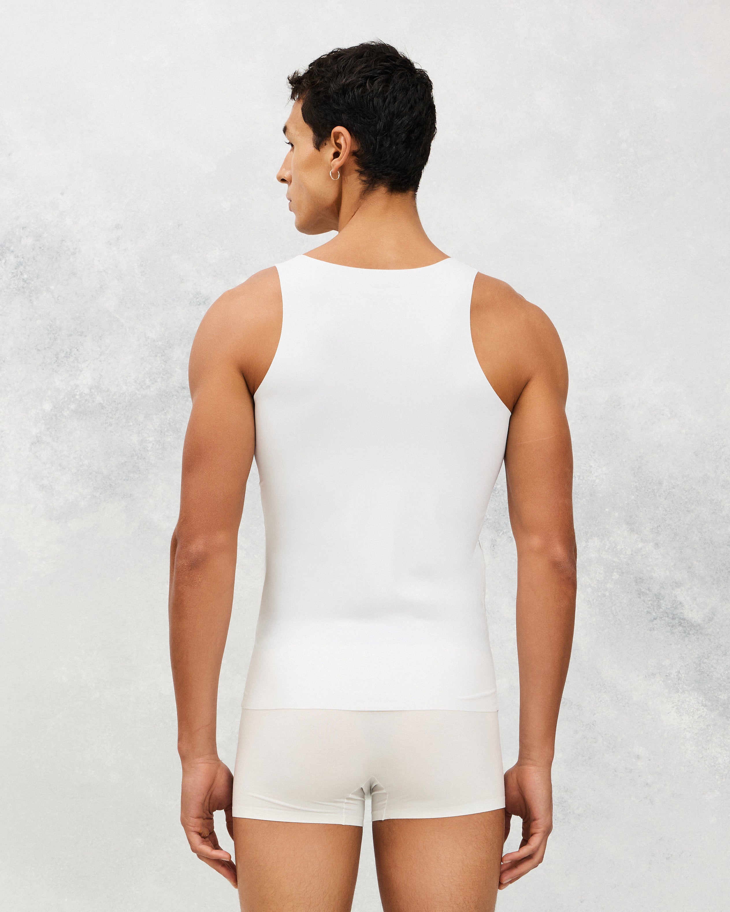 Back photo for a Model wearing Ice Tech Undershirt in white.