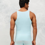 Back photo for a Model wearing Ice Tech Undershirt in baby blue.