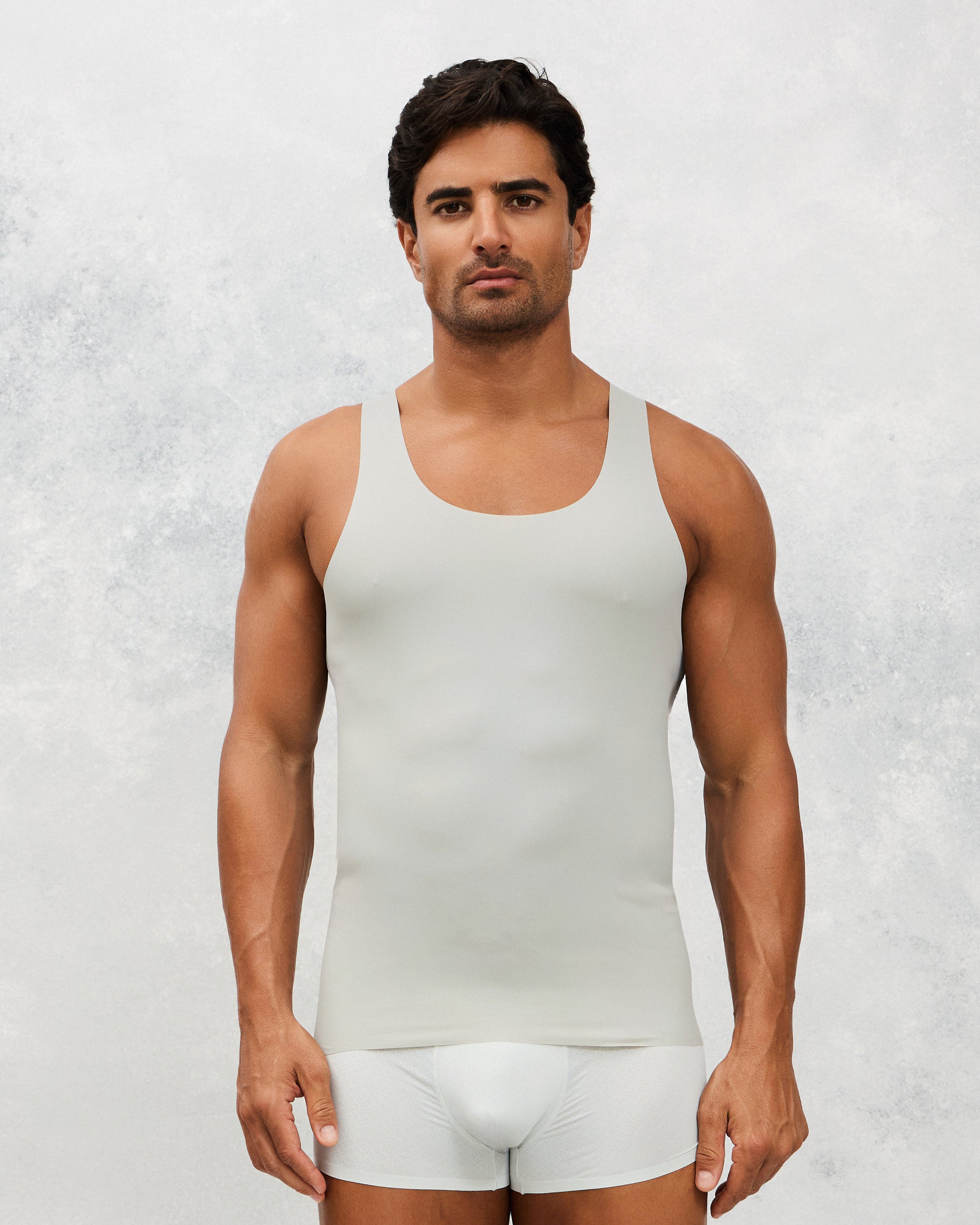 Front photo for a Model wearing Ice Tech Undershirt in grey.